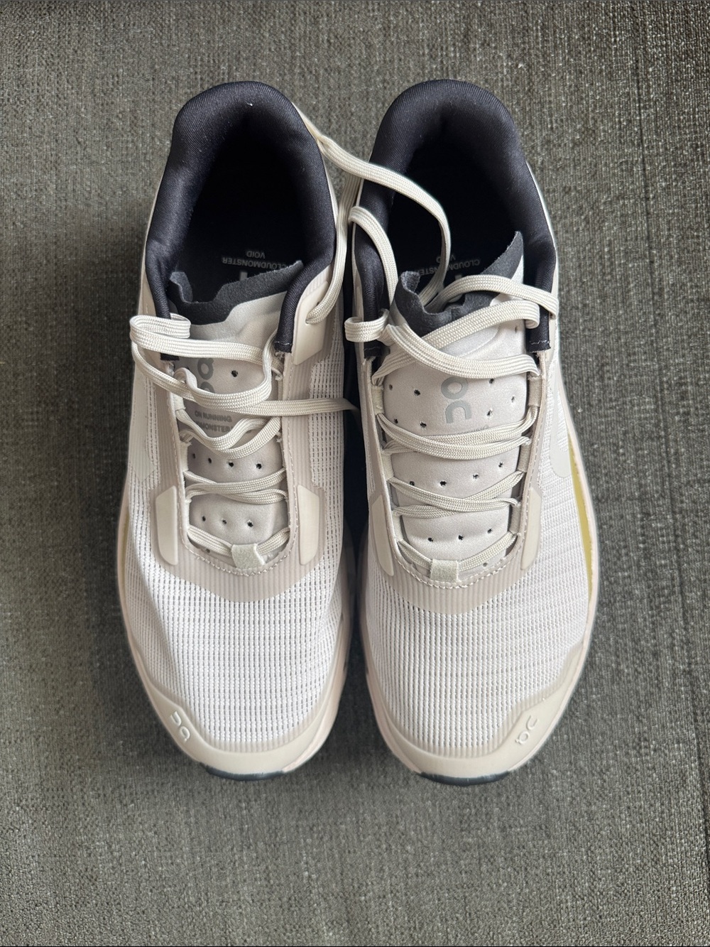 On Running Men’s Athletic Shoes in Off-White with Black Collar